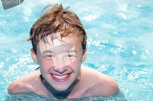 Image of Happy boy in a pool