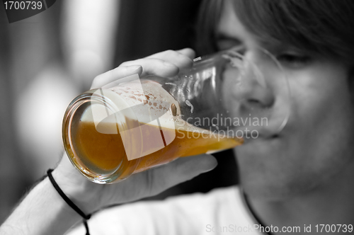 Image of Teenager drinking beer