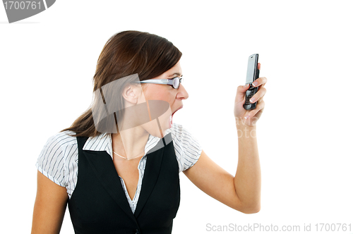 Image of Angry businesswoman shouting to mobile