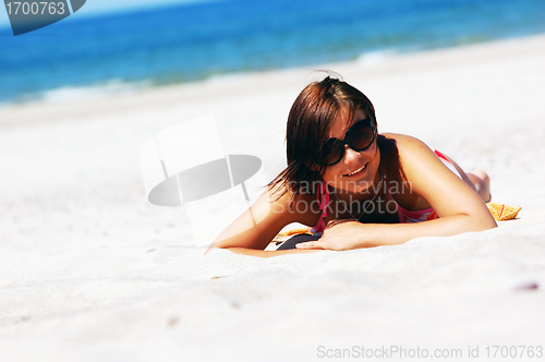 Image of Beautiful woman on the beach