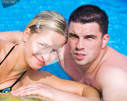 Image of Happy couple in a pool