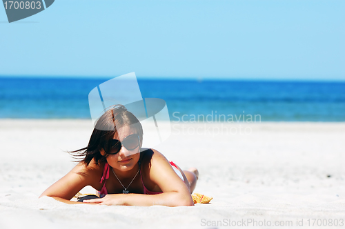 Image of Beautiful woman on the beach