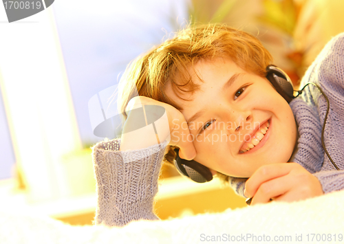 Image of Boy listen to music