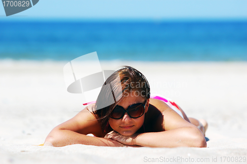 Image of Beautiful woman on the beach