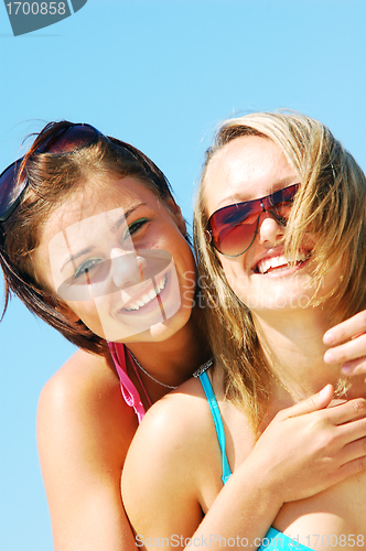 Image of Young women on the summer beach