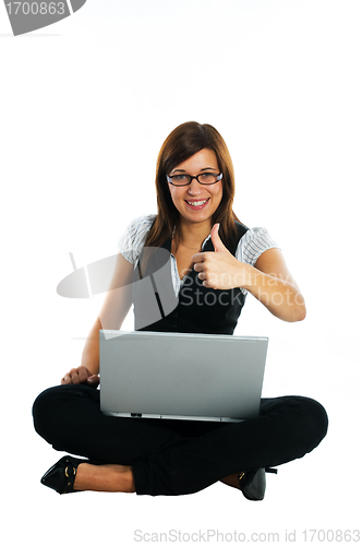 Image of Happy businesswoman with laptop