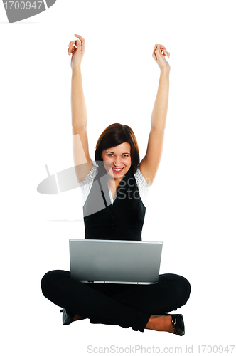 Image of Happy businesswoman with laptop