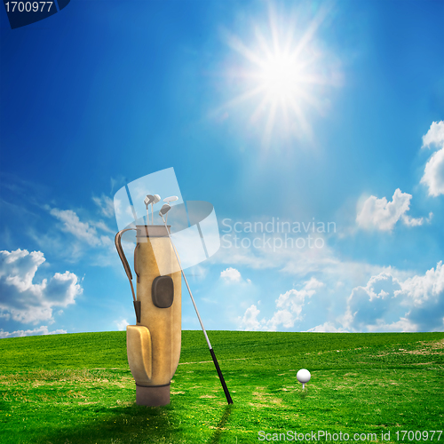 Image of Golf equipment and ball on golf course