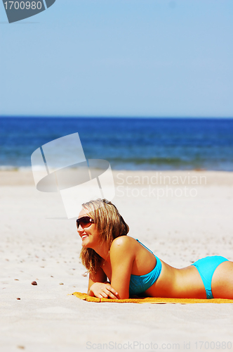 Image of Beautiful woman on the beach