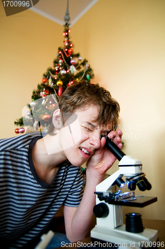 Image of Young boy with christmas present