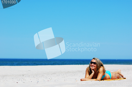 Image of Beautiful woman on the beach