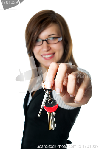 Image of Smiling developer gives keys to new home