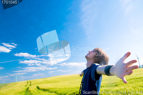 Image of Happy man with arms up