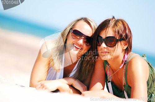 Image of Young girls on the summer beach