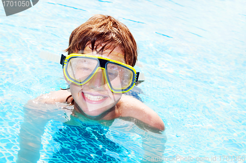 Image of Happy boy in a pool