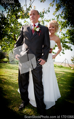 Image of Happy bride and groom after wedding