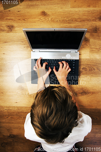 Image of Boy with notebook