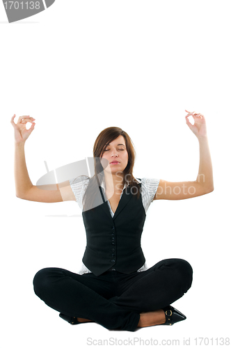 Image of Businesswoman relaxing, meditating