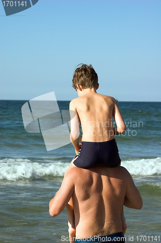 Image of Father with son on the beach