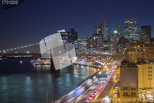 Image of Manhattan Panorama, view at night with office building skyscrape