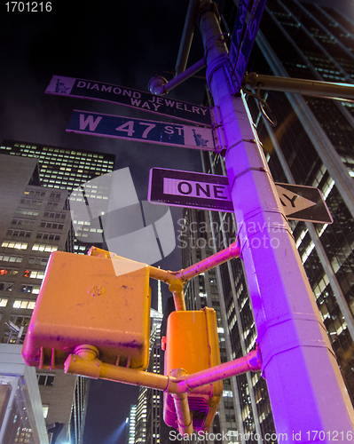 Image of New York City Street Signs at Night