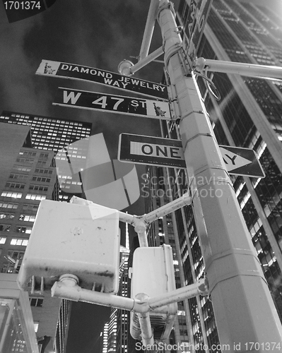 Image of New York City Street Signs at Night