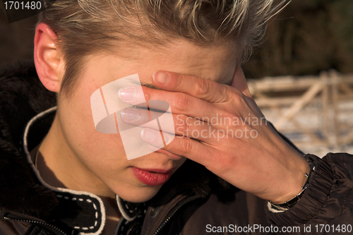 Image of sad woman outdoor 