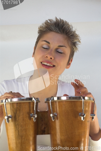 Image of woman and guitar