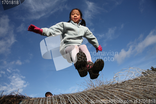 Image of happy child jump