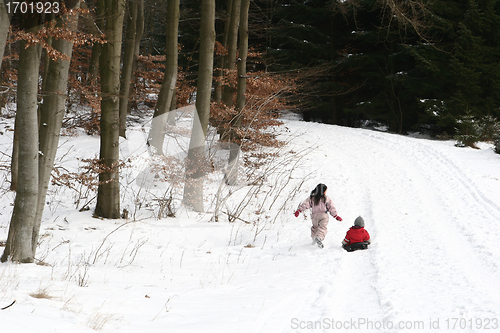 Image of child playing in the snow