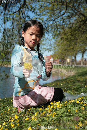 Image of child in flower