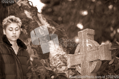 Image of woman and cross 