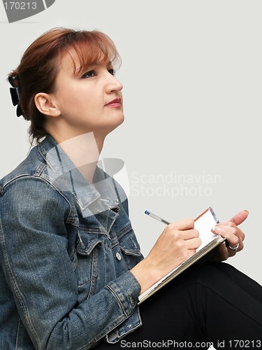 Image of Casual woman with her diary