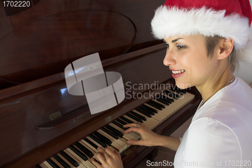 Image of woman and piano