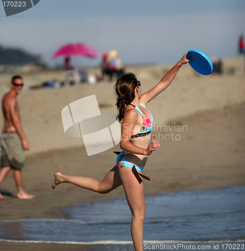 Image of Girl playing frisbee