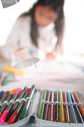 Image of  child  reading writting