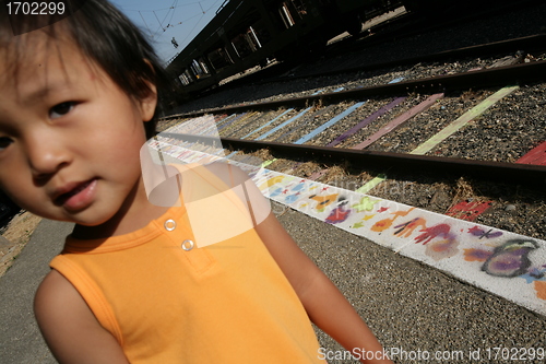 Image of Girl and railway track