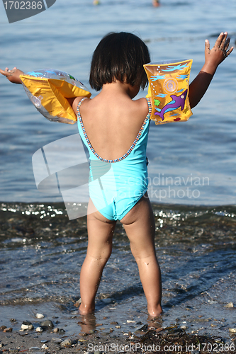 Image of child  and water