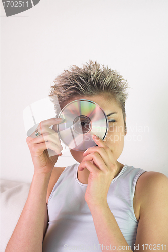 Image of woman and CD