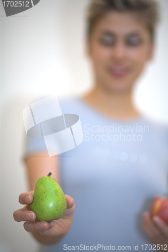 Image of woman pear and apple