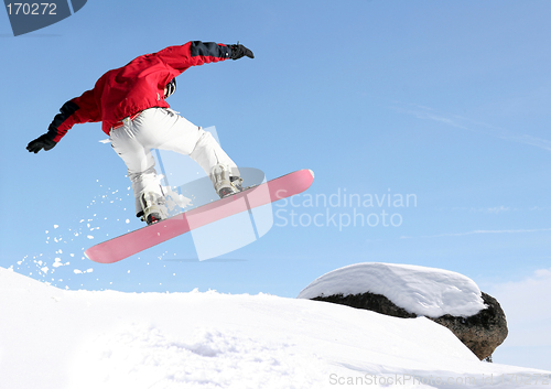 Image of Snowboarder jumping