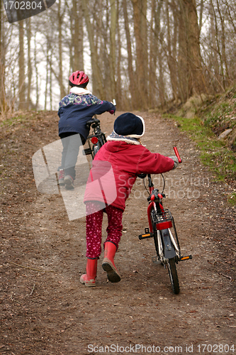 Image of children with bike