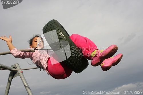 Image of seesaw child