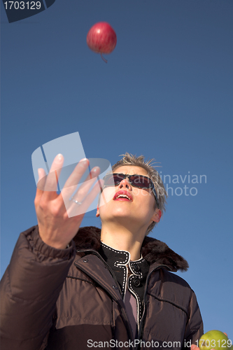 Image of woman pear and apple