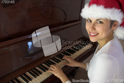 Image of woman and piano