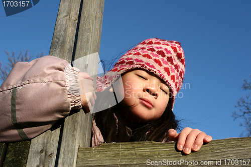 Image of child playing in the winter