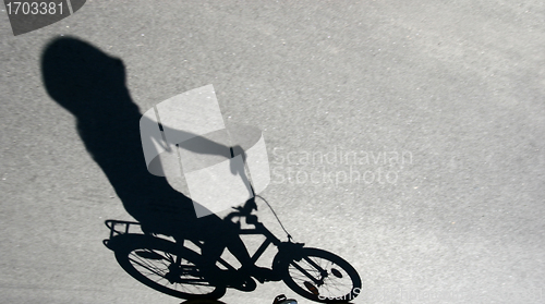 Image of shade of child on a bike