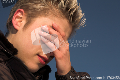 Image of sad woman outdoor 