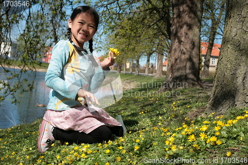 Image of child in flower