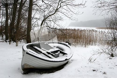 Image of foggy winter boat
